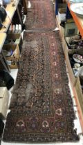 Two vintage Agra carpet sections with scrolling floral borders approx.