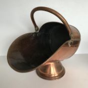 A late Victorian copper coal helmet