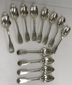 Twelve 19th Century "Fiddle" pattern dessert spoons, various dates and makers, 15.