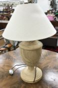 A Neptune turned wooden table lamp of baluster form, 53 cm high including fittings,