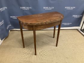 A 19th Century mahogany bow fronted foldover tea table,