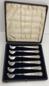A cased set of six Edwardian silver handled orange peeling knives (by William Hutton & Sons of