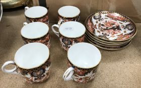 A Royal Crown Derby "Japan" pattern set of six coffee cans and five saucers