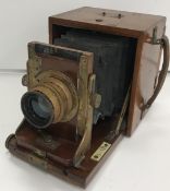 A mahogany cased bellows plate camera by CP Goerz of Berlin with Doppel Anastigmat Series III No.