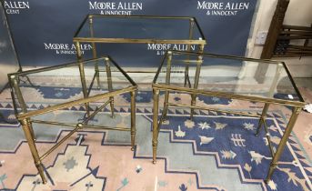 A nest of three vintage / retro brass framed glass topped tables, the biggest 35.5cm depth x 59.