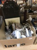 A box of sundry items to include various tea plates, decanters,