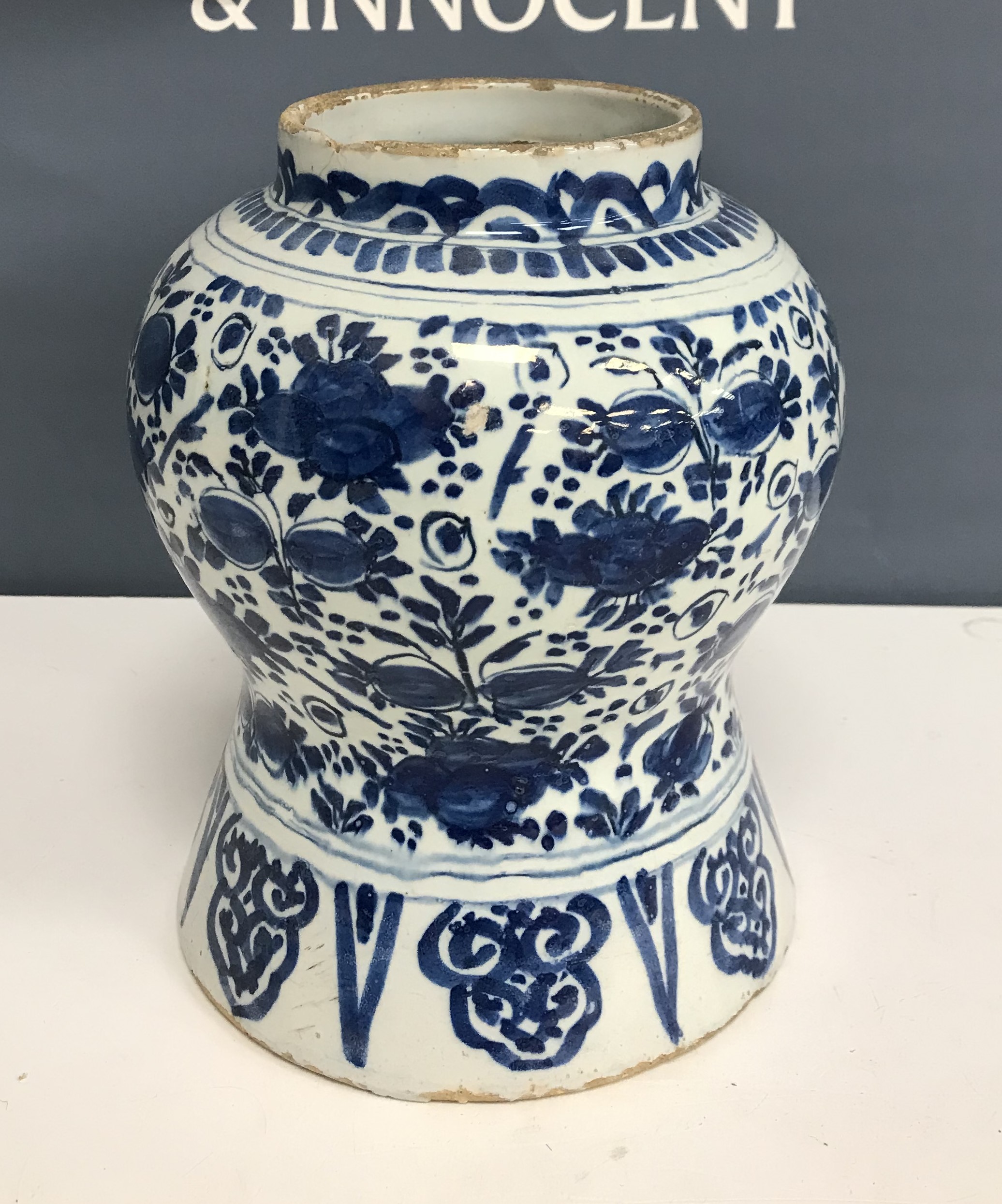 An 18th Century Delft blue and white baluster shaped jar,