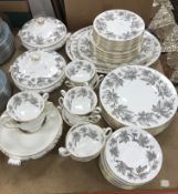 A Wedgwood "Ashford" (W4106) fig decorated dinner service, 12 place settings including large,