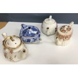 Four boxes of assorted decorative and novelty teapots,