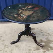 A 18th Century oval pedestal tripod table on cabriole legs to pad feet,