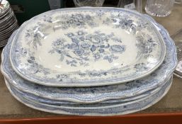 Four various Victorian blue and white transfer decorated meat platters and another similar