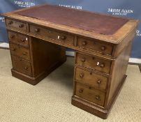 A Victorian oak double pedestal desk by Druce & Co of London,