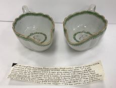 A pair of early 19th Century Chinese Export ware famille verte sauceboats of ribbed form with gilt
