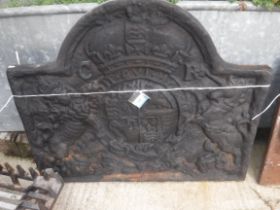 A cast iron fire back with Royal insignia and initialled CR 79 cm high x 100 cm wide