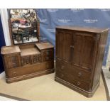 A mid 20th Century oak tallboy in the Gothic style with two cupboard doors above two drawers 85 cm