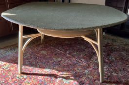 A 1930s Lloyd Loom circular dining table,