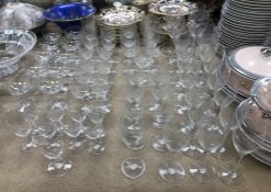 A collection of 64 Baccarat drinking glasses comprising a set of four large wines,