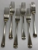 A set of five George III silver table forks plus one similar (by Thomas Dicks, London 1803),