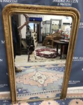 A Victorian incised giltwood and gesso framed foliate decorated mantel mirror with plain plate 93