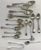 A collection of silver to include three silver dessert spoons of varying dates and makers,