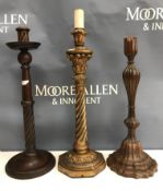 A 19th Century mahogany and carved candlestick of petal form 40.