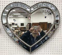 A modern Venetian type glass love heart shaped wall mirror with bevel edged glass 54 cm x 60 cm