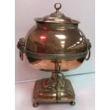 A 19th Century copper samovar with lion mask ring handles and brass tap 43 cm high,