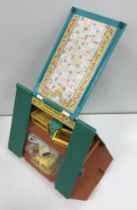 A vintage Fisher Price play family A frame house,