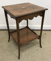 An Edwardian rosewood two tier occasional table with fan marquetry inlaid medallion to the top 43