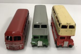 A Dinky Toys Duple Roadmaster Leyland Royal Tiger bus and two Dinky Toys double decker buses (1 x