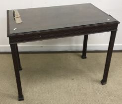 An Edwardian mahogany centre table,