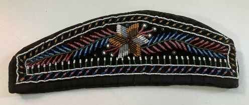 A native American beadwork decorated "Glengarry" cap (possibly Iroquios),