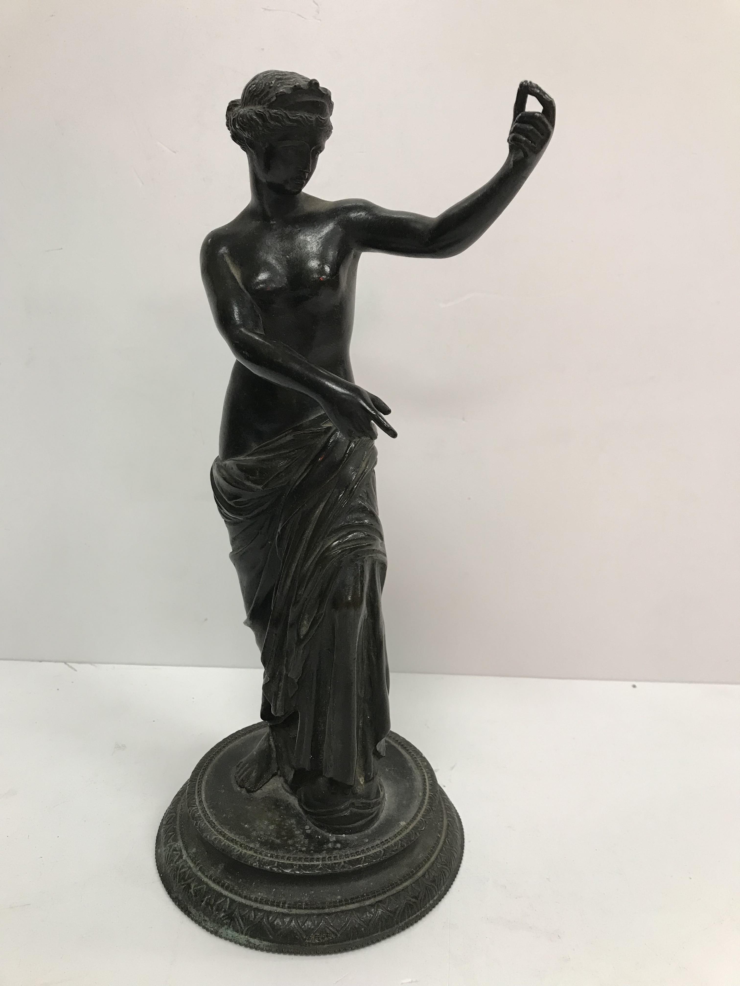 A 19th Century Continental bronze figure of the Venus or Aphrodite of Capua admiring herself in the