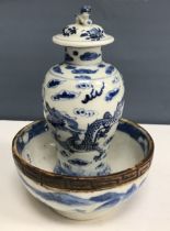 A Chinese blue and white baluster shaped vase and cover,