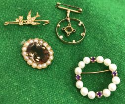 Four various seed pearl mounted brooches, one as a bird and clover, one set with oval smoky quartz,