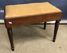 Two Victorian mahogany framed rectangular stools, one on brass caps and castors (bidet conversions),