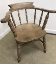 A beech framed smoker's bow chair with elm seat,