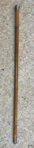 A Victorian malacca cane swordstick with engraved and blued foliate decoration to the blade and