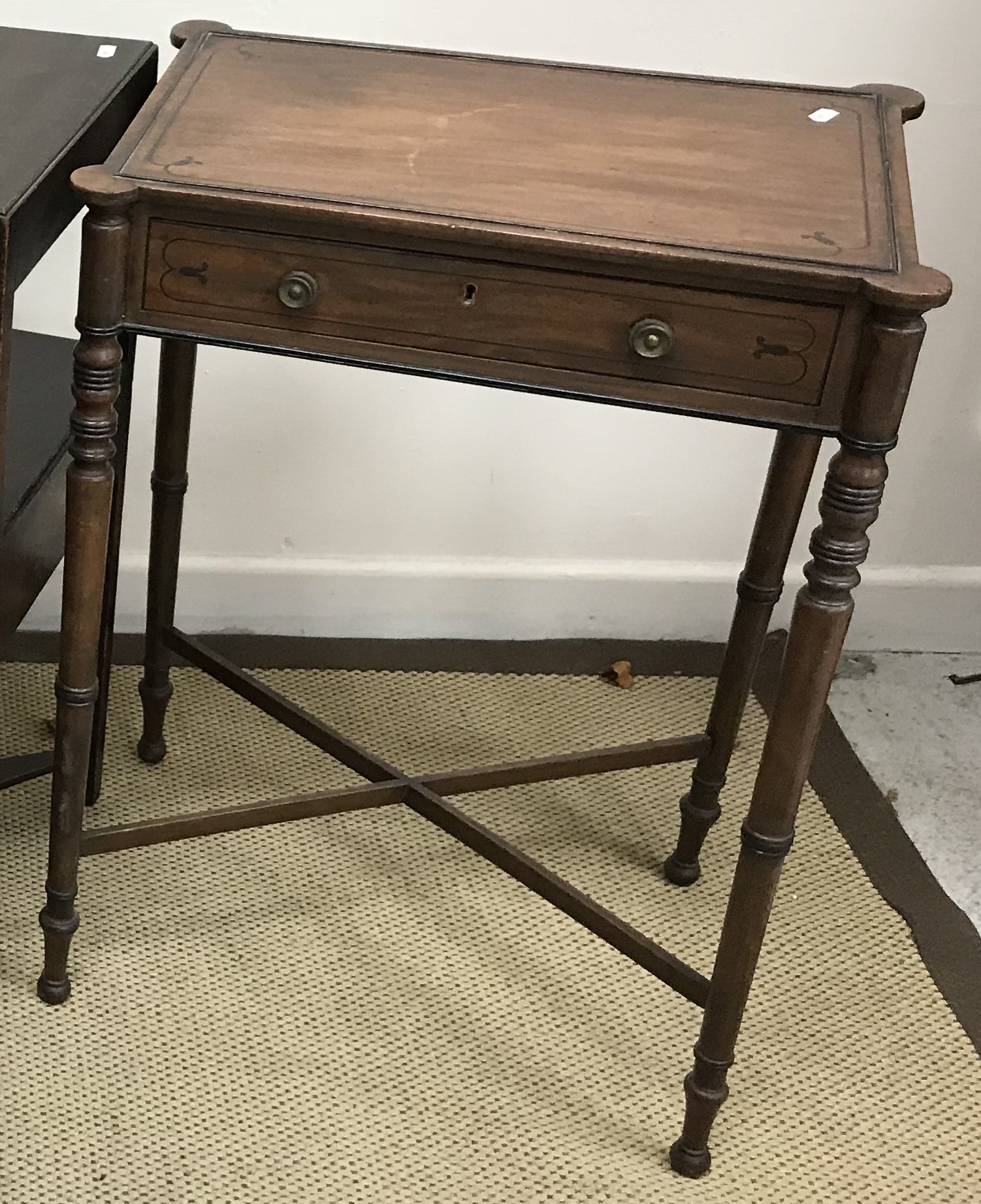 A late Regency mahogany and rosewood strung side table,