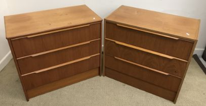 A pair of mid to late 20th Century three drawer bedroom chests,