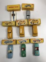 A collection of eight various Dinky Toys including Jaguar XK120 coupe (157),