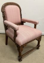 A late Victorian show frame elbow chair in the manner of Pugin,