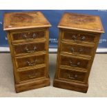 A pair of walnut dwarf chests in the Geo