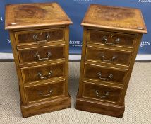 A pair of walnut dwarf chests in the Geo