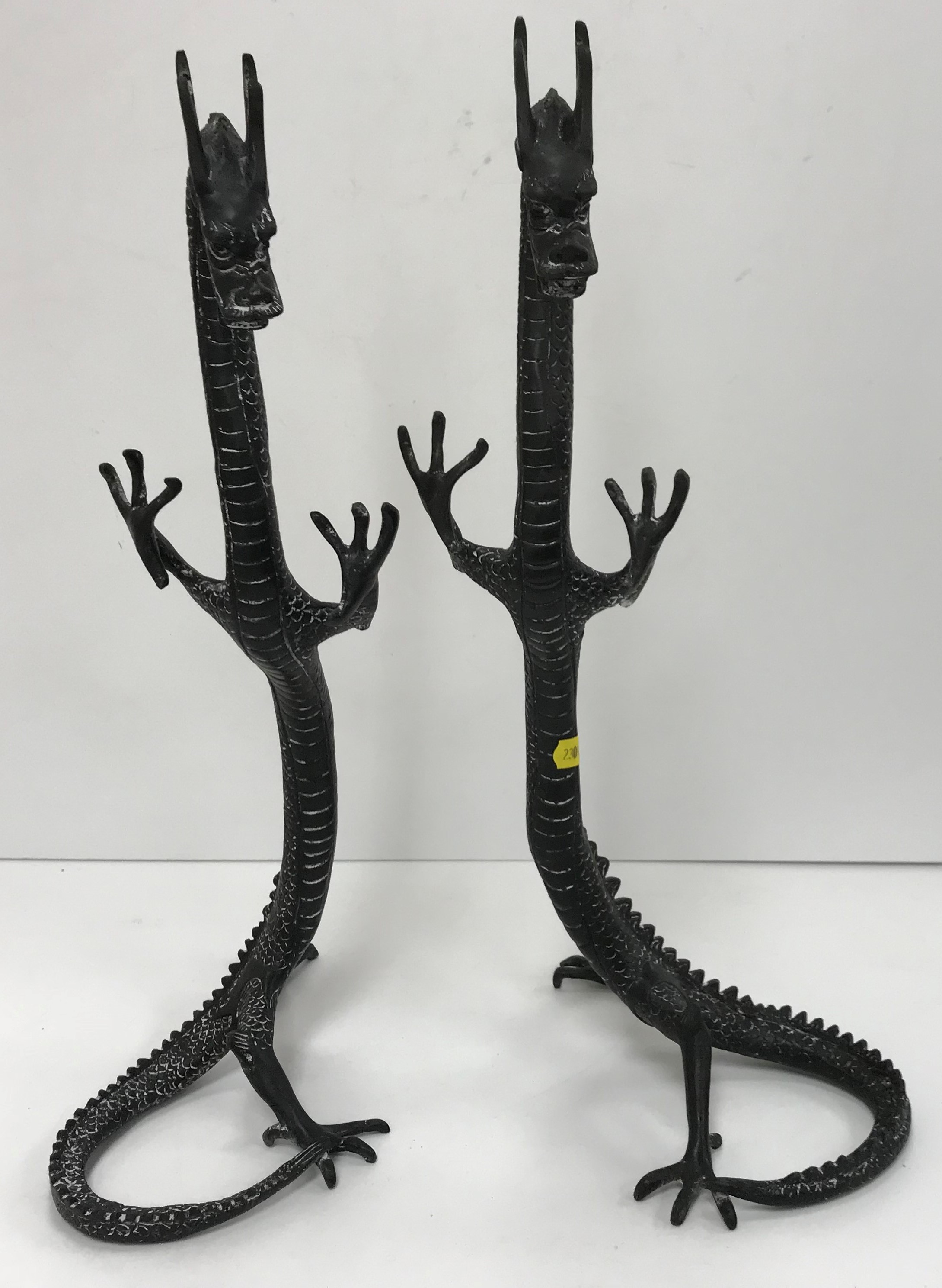 A pair of modern cast bronze dragon mode