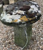 A natural stone staddle stone (top split