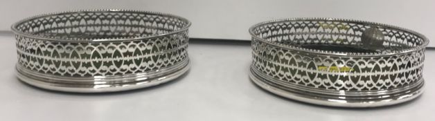 A pair of George III pierced silver bott