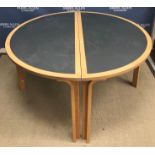 A Danish circular modular dining table i