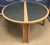 A Danish circular modular dining table i