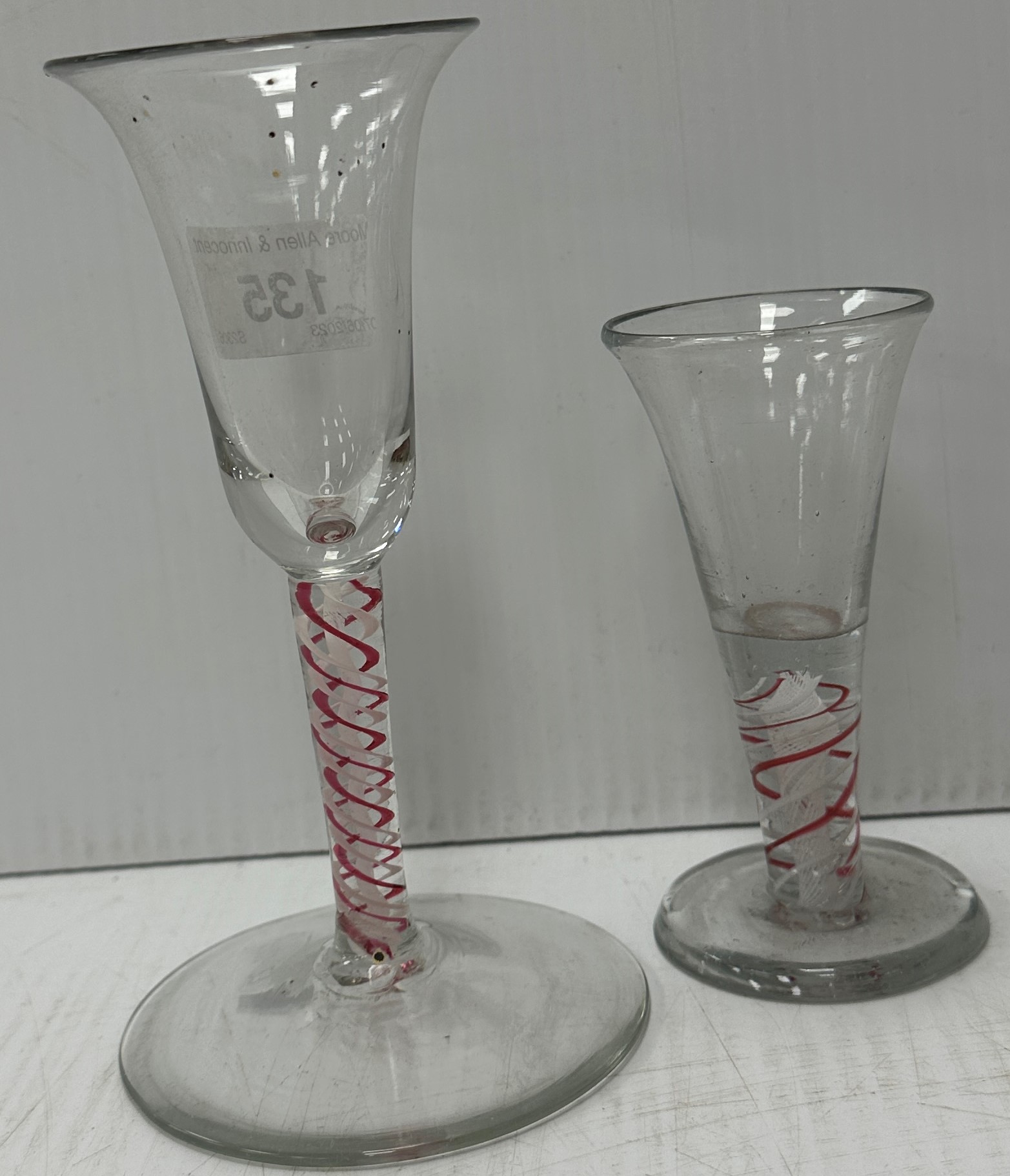 A Georgian enamel twist stem wine glass